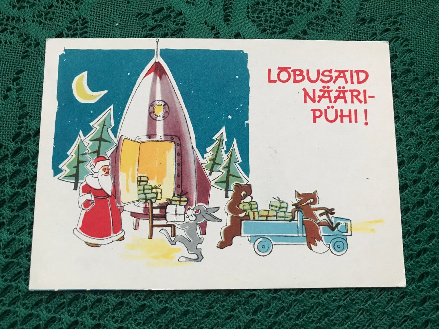 Estonian Christmas / New Year Greeting card - Artist E.Tali - Santa Claus collecting gifts into Space Ship - 1963 - unused